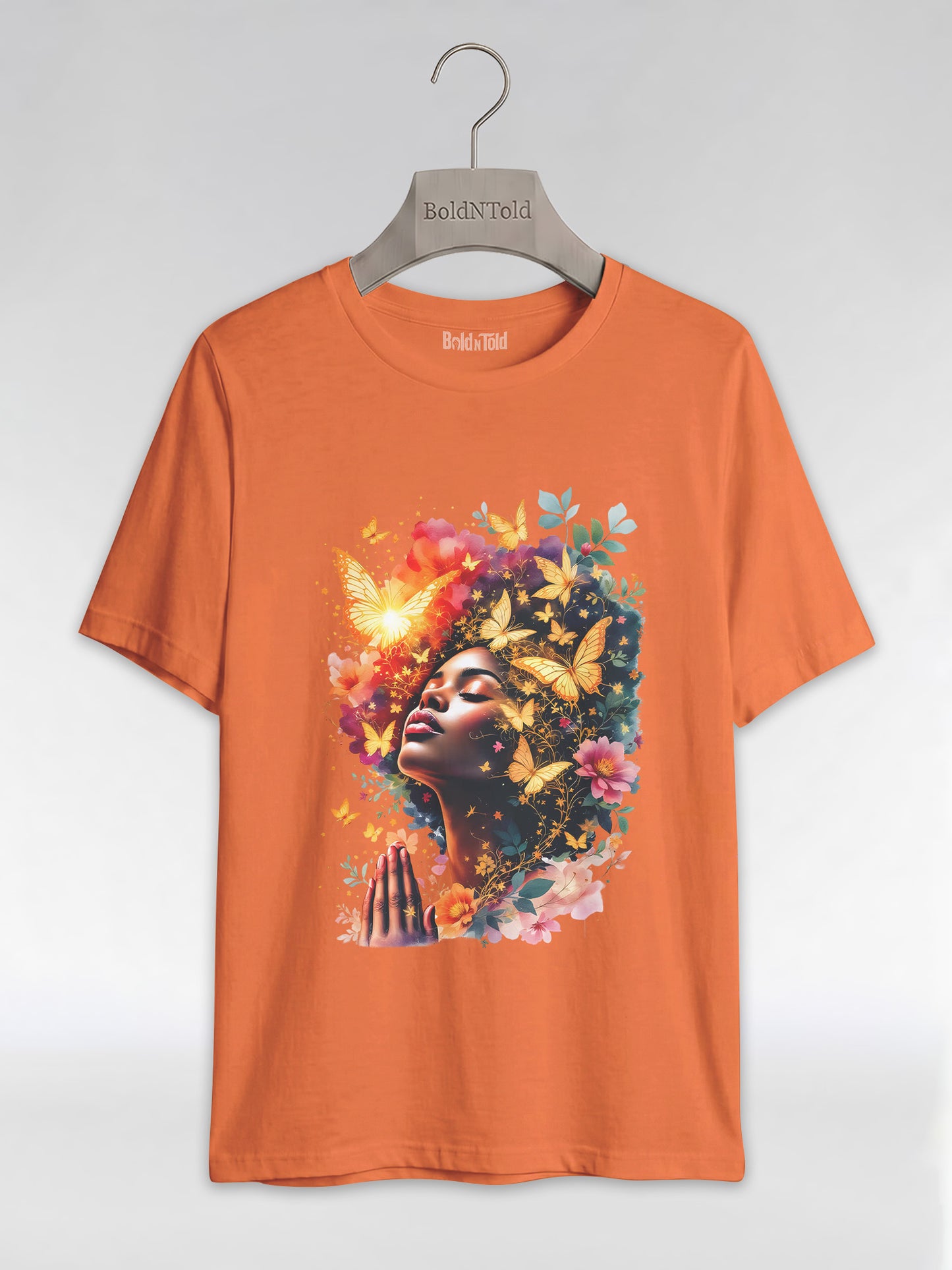 Praying Black Queen: Ethereal Floral Butterfly Graphic T-Shirt - BoldnTold