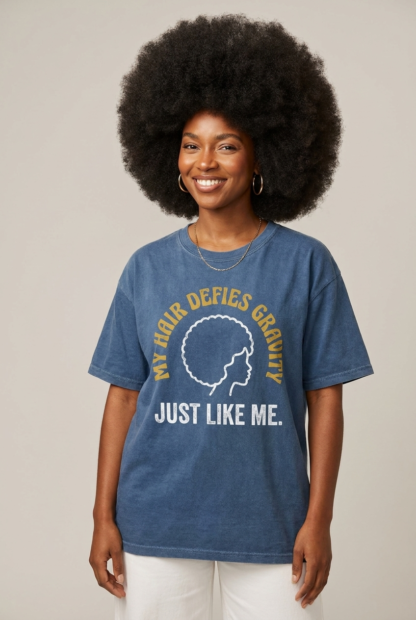 My Hair Defies Gravity Just Like Me: Black Girl Magic Afro Graphic T-Shirt - BoldnTold