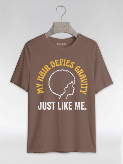 My Hair Defies Gravity Just Like Me: Black Girl Magic Afro Graphic T-Shirt - BoldnTold