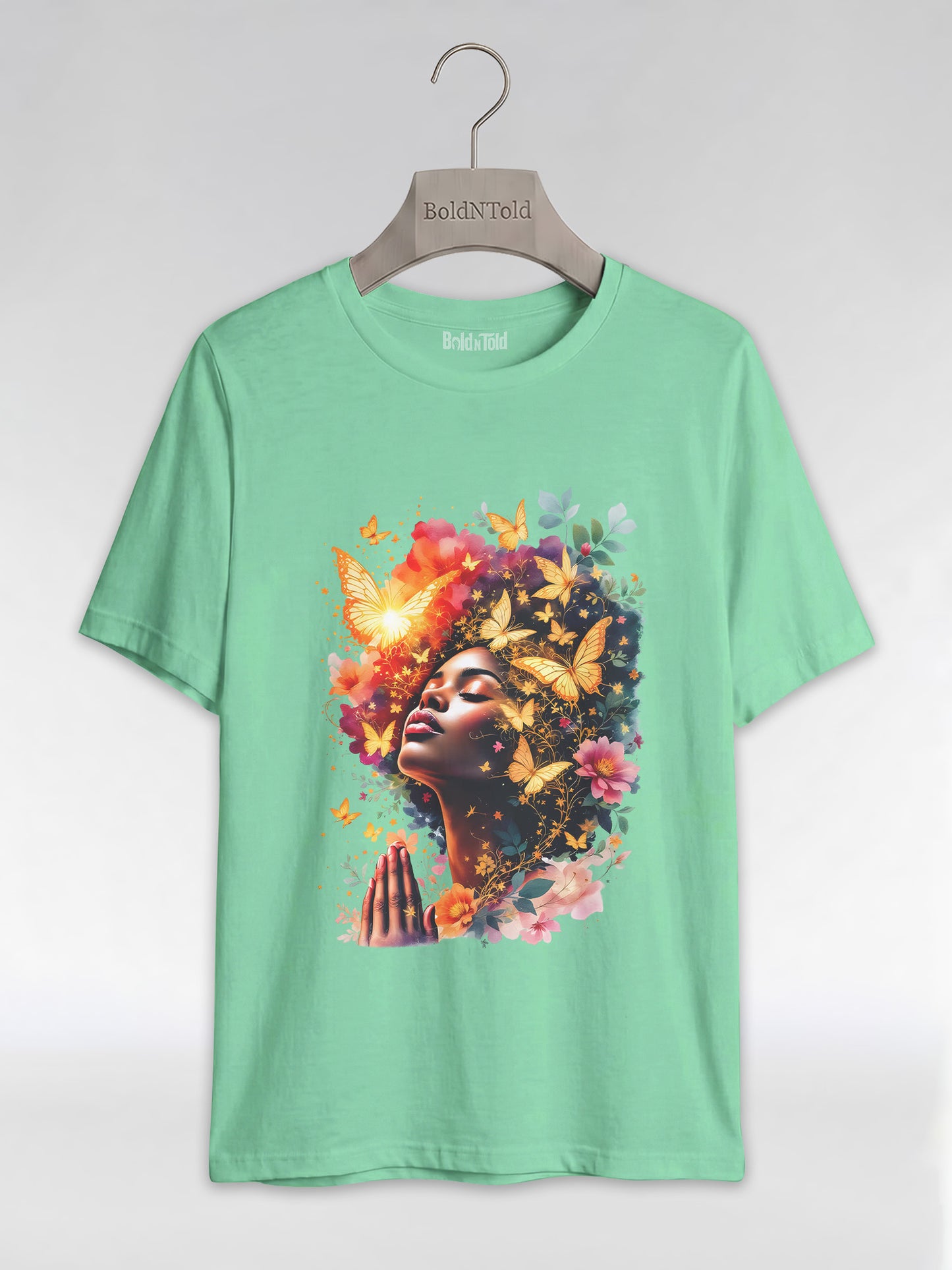 Praying Black Queen: Ethereal Floral Butterfly Graphic T-Shirt - BoldnTold