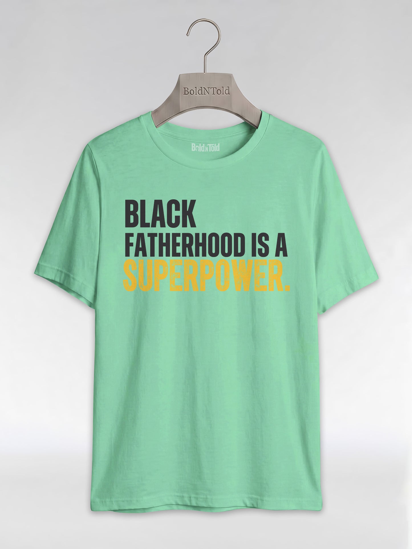 Black Fatherhood Is A Superpower: Proud Black Dad Graphic T-Shirt - BoldnTold